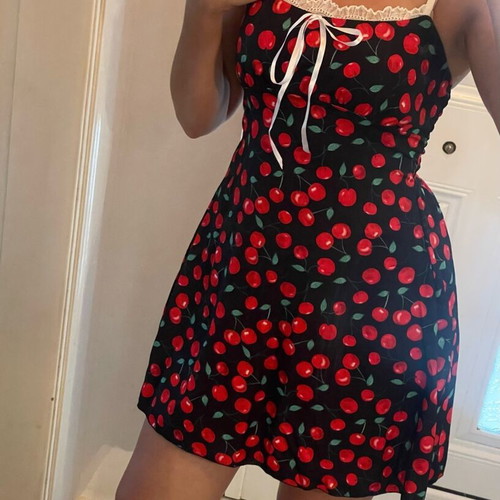 Mini black dress with cherries