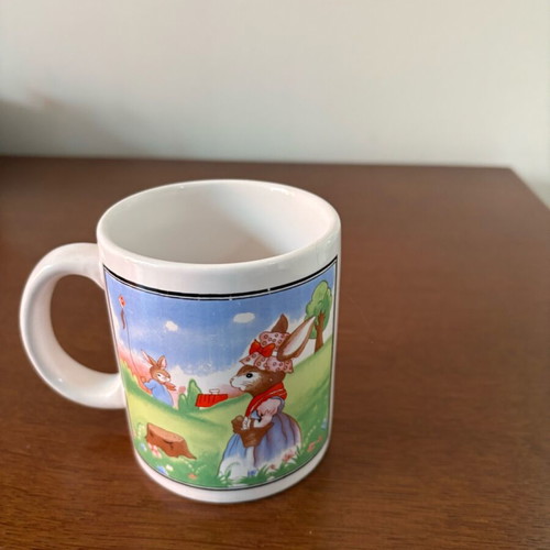 Vintage children's ceramic mug with Easter theme like new