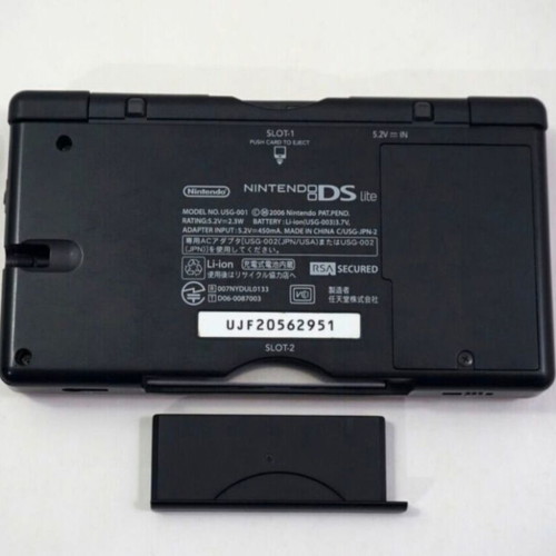 Nintendo DS Lite console used with Pokemon LeafGreen cartridge and accessories