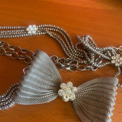 Metal belt like new, silver with bow and rhinestones
