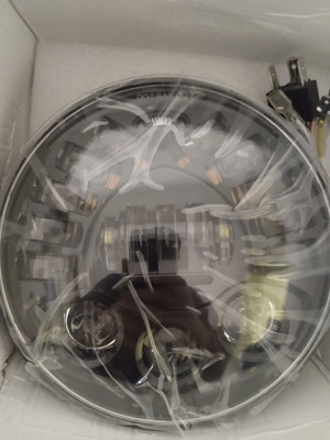 7'' LED Motorcycle Headlight new with integrated turn signals, metal