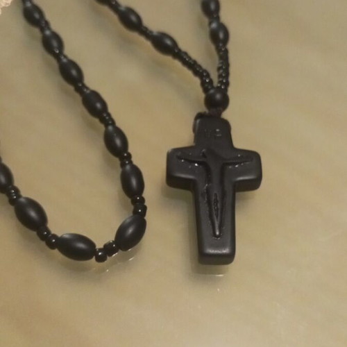 Men's black cross made of natural stone like new