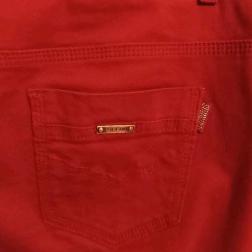 Sunbird women's sports pants like new, brick red, size 34