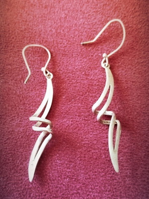 Earrings new, silver color by A&D