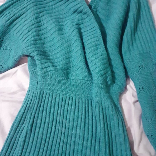 Knitted blue dress new with perforated sleeve designs and back opening size M