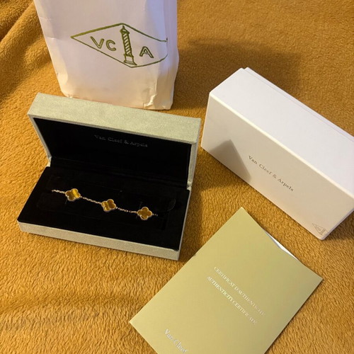 Van Cleef & Arpels bracelet like new, unisex, beige and gold