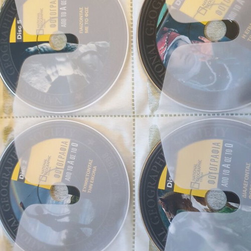 Discovery National Geographic DVD new, pack of 128 in album case