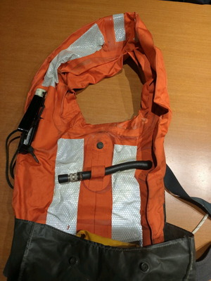 U.S. NAVY life jacket used, complete with oxygen bottle and phosphorescent stick