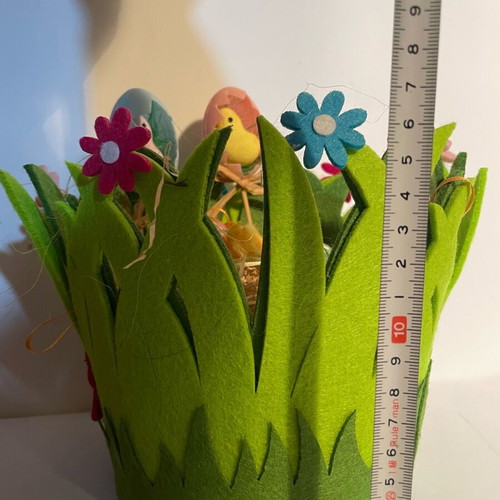 Easter felt basket with decorative eggs and flowers like new