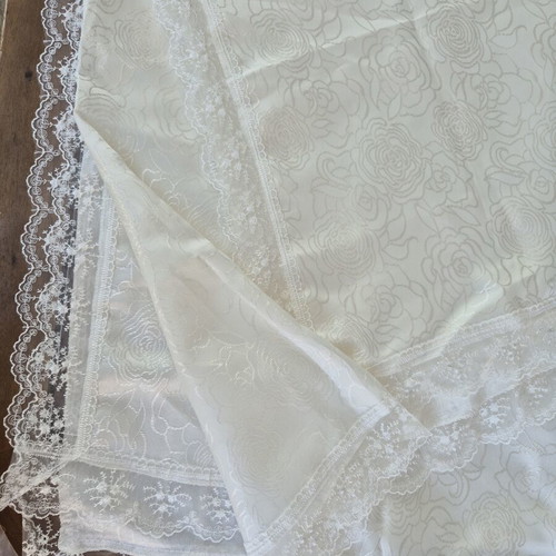 White floral tablecloth with delicate lace edges like new