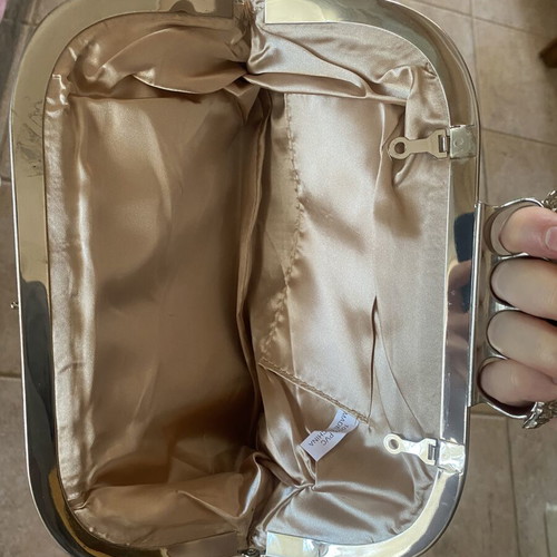 Skull Ring Clutch Bag like new, nude beige with metal frame