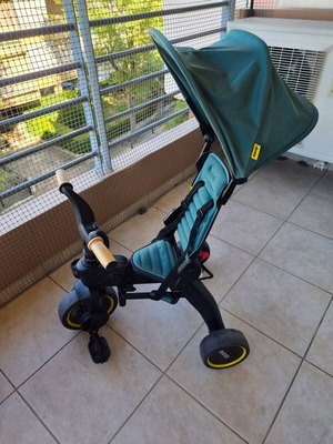 Doona Liki Trike foldable children's tricycle with canopy
