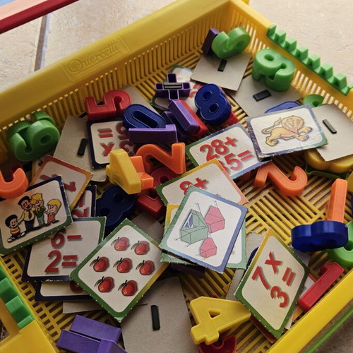 Magnetic board with numbers and math magnets