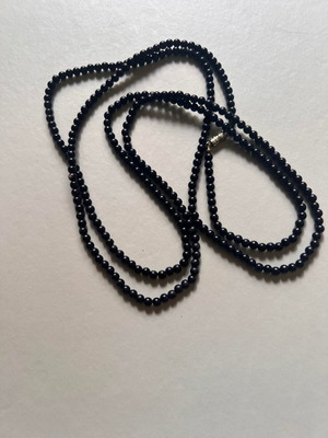 Beaded necklace used, black, can be worn as bracelet