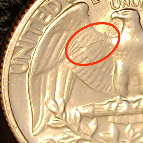 US quarter dollar 1965 used with mint error die break
