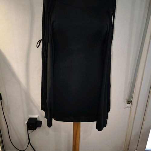 Black asymmetric top like new with ties and semi-transparent sleeves size M