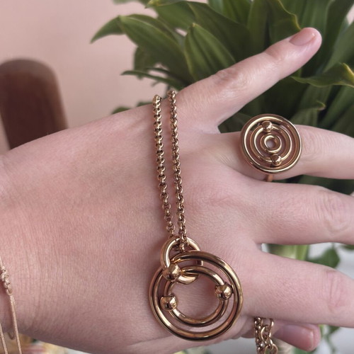 Folli Follie ring pink gold with concentric circles like new