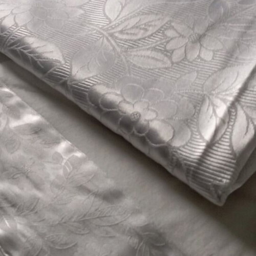 Bridal bedding set like new with satin designs and quilted coverlet