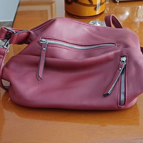 Handbag new, wine color with multiple external pockets