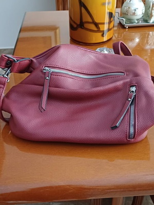 Handbag new, wine color with multiple external pockets