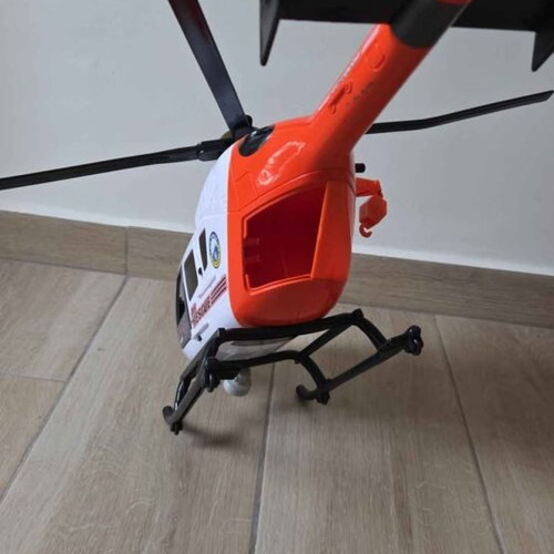 Helicopter toy used with buttons, sounds, and light