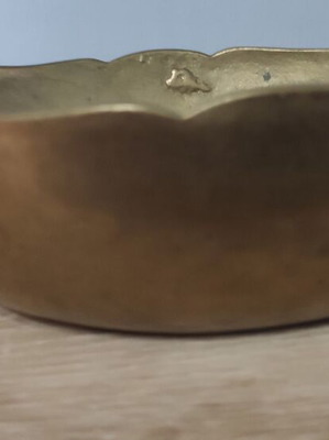 Vintage decorative brass bowl with two handles and wavy rim