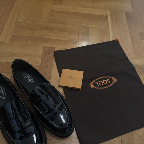 Tod's leather loafers size 40.5 like new, black patent leather