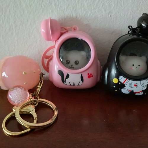 Illuminated keychains set of 3 like new, black and pink