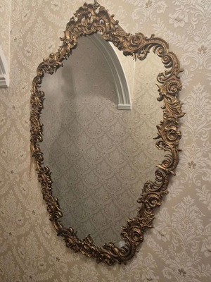 Rococo style wall mirror with gold embossed frame