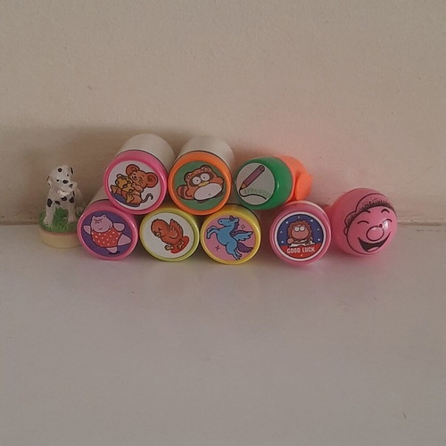 Collection of 1990s children's rubber stamps with original ink