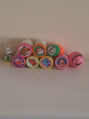 Collection of 1990s children's rubber stamps with original ink