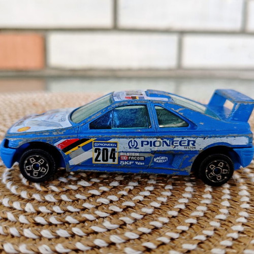 Peugeot 405 T16 Grand Raid diecast model used, vintage 1:43 scale
