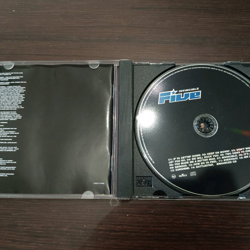 Five Invincible CD used, in excellent condition, unscratched