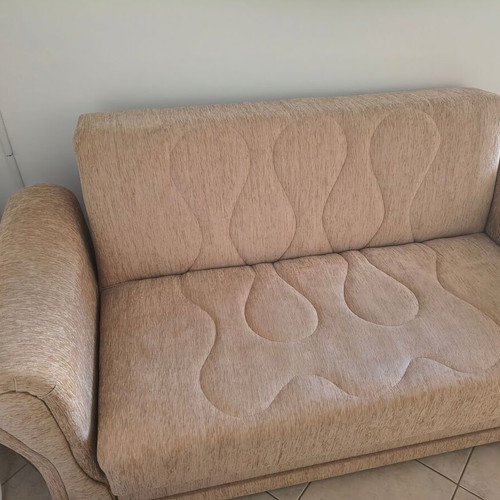 Two-seater sofa bed, beige fabric with storage