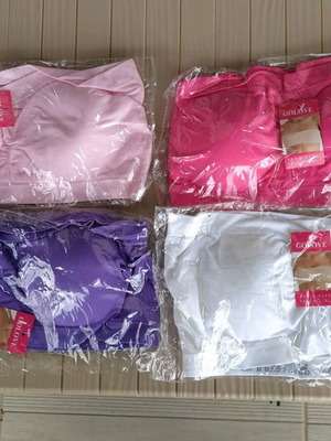 Pack of 4 tops new with removable pads, size L/XL