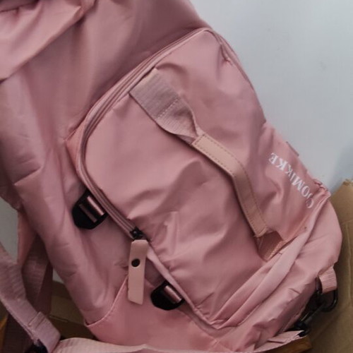 Barrel-shaped pink backpack