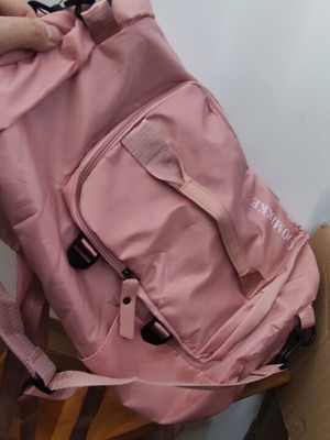 Barrel-shaped pink backpack