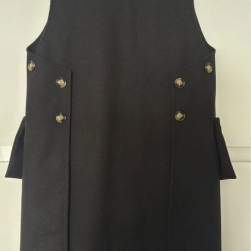 Wool vest black, like new, one size with external pockets