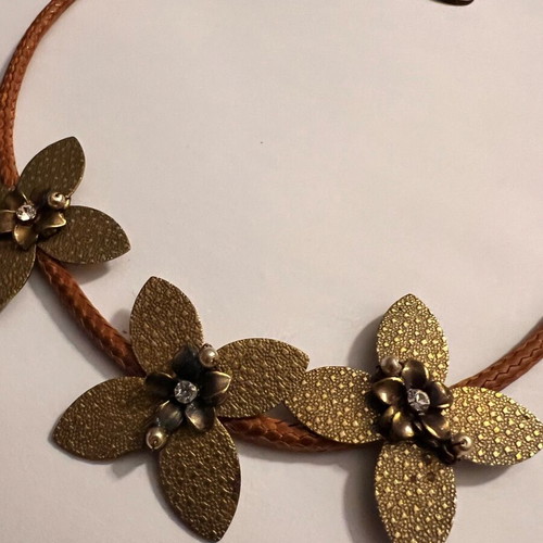 Brown leather necklace with metal floral details and rhinestones like new