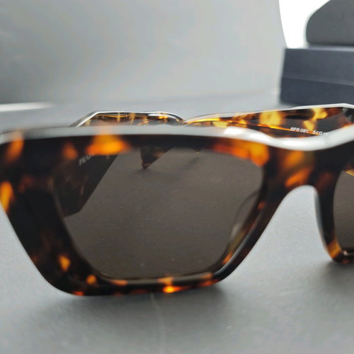 Prada sunglasses used with original box and case