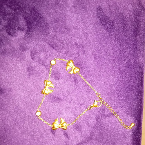 Steel bracelet like new, gold tone