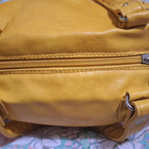 Women's mustard small hand bag used