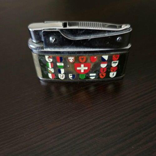 Vintage Switzerland Collectible Pocket Lighter used, fully functional