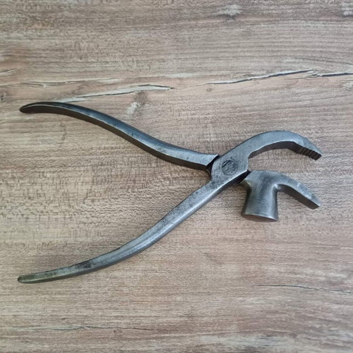 Vintage lasting pliers used cobbler tool for leather stretching and nail removal