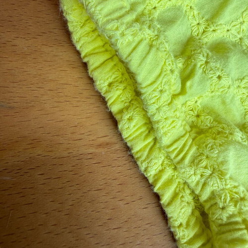 Zara yellow top used with ruffles and asymmetric neckline