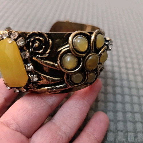 Vintage bracelet used in bronze, green and mustard shades