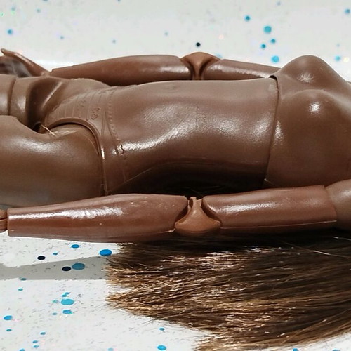 Barbie Made to Move African-American doll used with small flaws