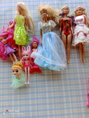 Various dolls with accessories