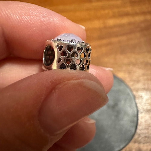 Silver symbol for bracelet like new used
