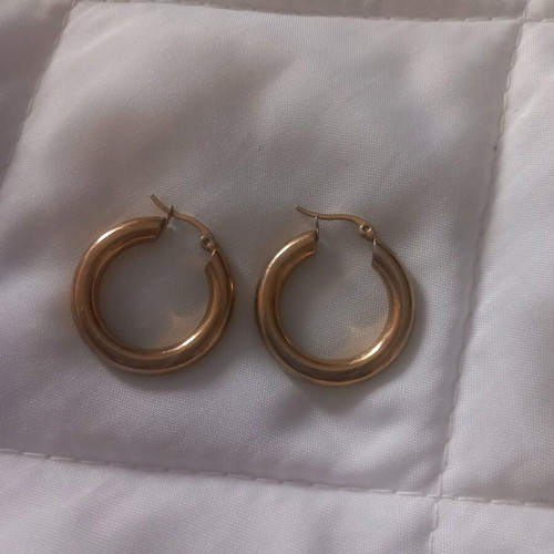 Stainless steel earrings used, gold color hoops